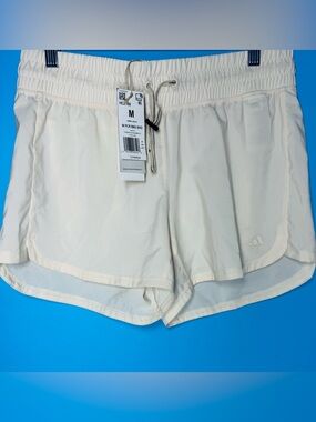 NWT Adidas Women's Pacer
Bungee Training Shorts in
Wonder White